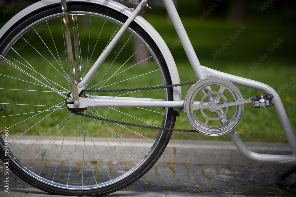 Closeup of retro bicycle on nature background. City bike. Active life and sport concept. Closeup of retro bicycle on nature background. City bike. Active life and sport concept.