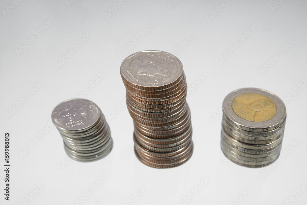 Thai coins,ten bath,stack,tower,white background Thai coins,ten bath,stack,tower,white background