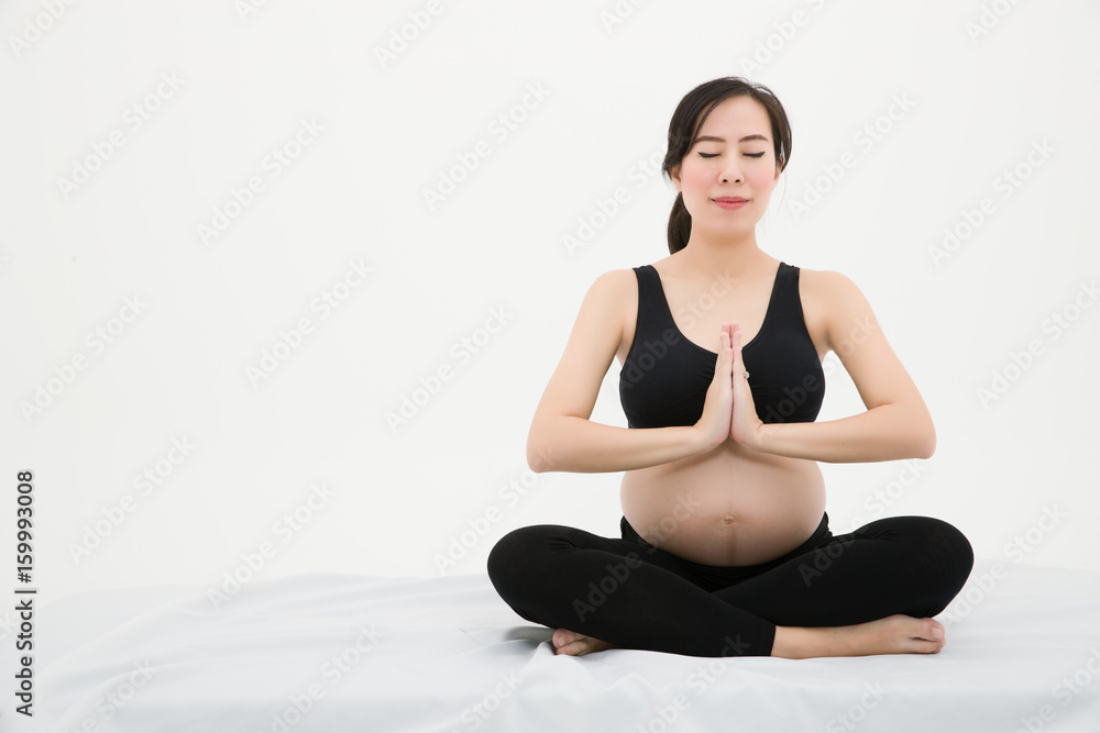 Pregnant Woman Sitting and put her hands together Pregnant Woman Sitting and put her hands together