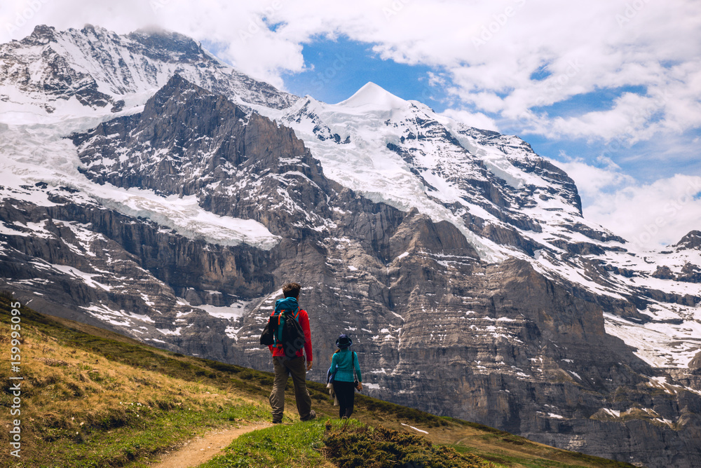 Hiking in the beautiful Alps. Scenic landscape. Outdoor activities in Switzerland. 2017 Hiking in the beautiful Alps. Scenic landscape. Outdoor activities in Switzerland. 2017