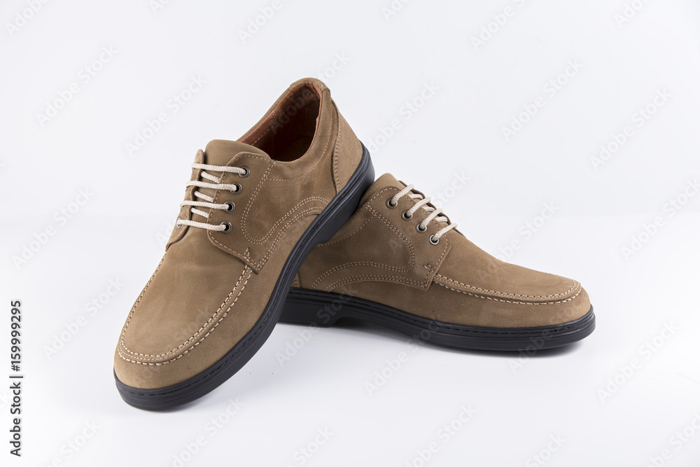 Male Brown Shoe Leather on White Background, Isolated Product, Top View, Studio. Male Brown Shoe Leather on White Background, Isolated Product, Top View, Studio.