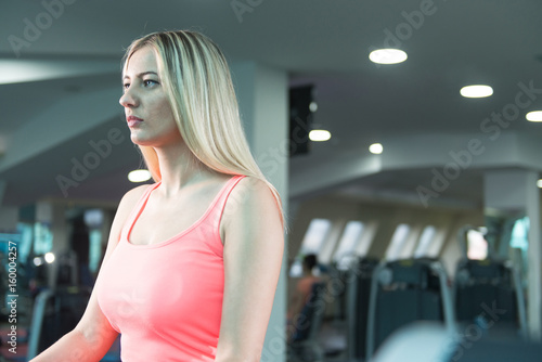Healthy Woman Running On Treadmill