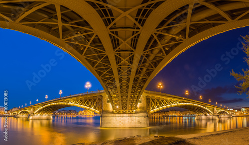 Budapest, Hungary - Panoramic shot taken under the famous Margaret bridge at blue hour