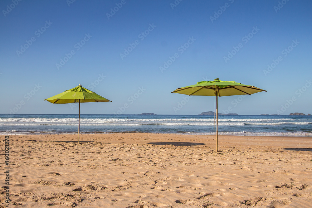 Geriba Beach in Buzios, Brazil. Two umbrellas
