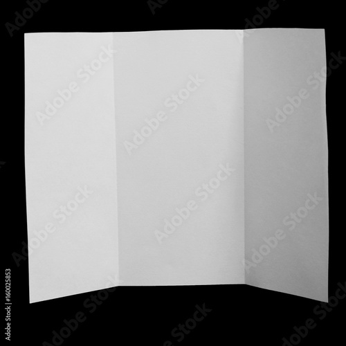 blank folded paper on white