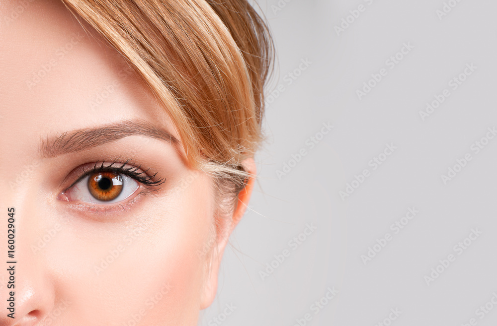 Obraz premium Beauty concept. Beautiful female brown eyes