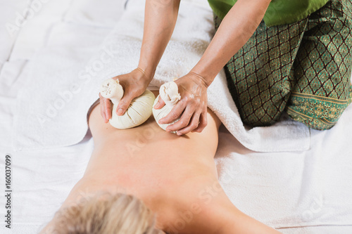 portrait of young beautiful woman in spa environment photo