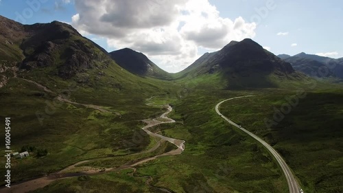 timelapse footage of the main road through glencoe during a scottish sunny afternoon in summer looking towards the pass to glen etive