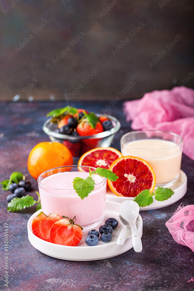 Strawberry yogurt  on a table. Selective focus. Copy space