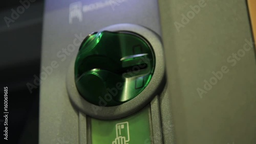 woman hand inserting credit card in atm. banking cash machine