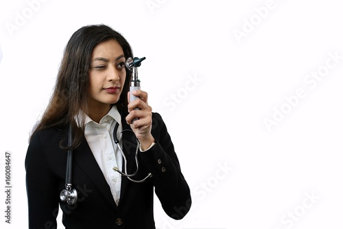 Attractive smart confident doctor wearing a suit an stethescope