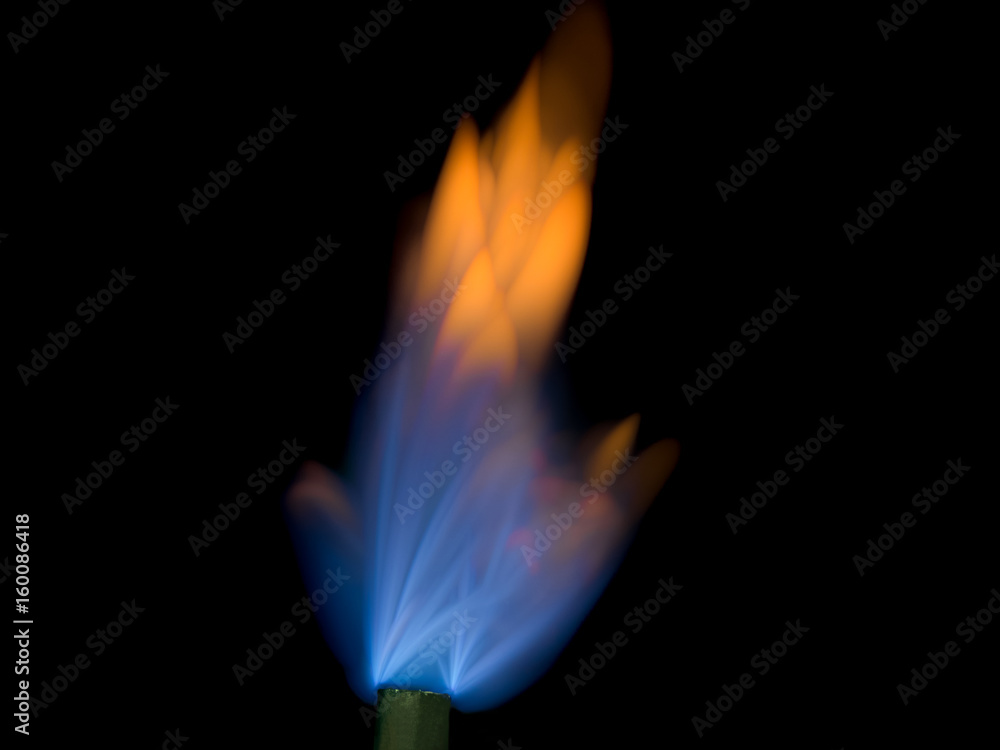 close up shot on flame, hot spot details of fire on black close up shot on flame, hot spot details of fire on black