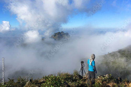 Photographer is watching view beautiful at Doi Luang Chiangdao in Chiangmai, Thailand.