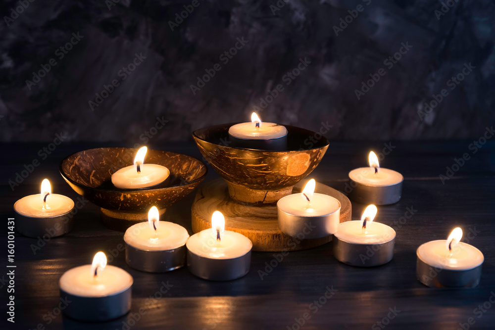 Many burning candles in dark background   in concept spa relaxing , holiday ,merry christmas, REST IN PEACE