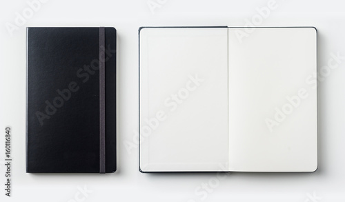 Business concept - Top view collection of black notebook on white background desk for mockup photo