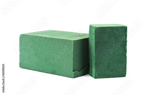 Photography Green flora foam and gardener tool on white