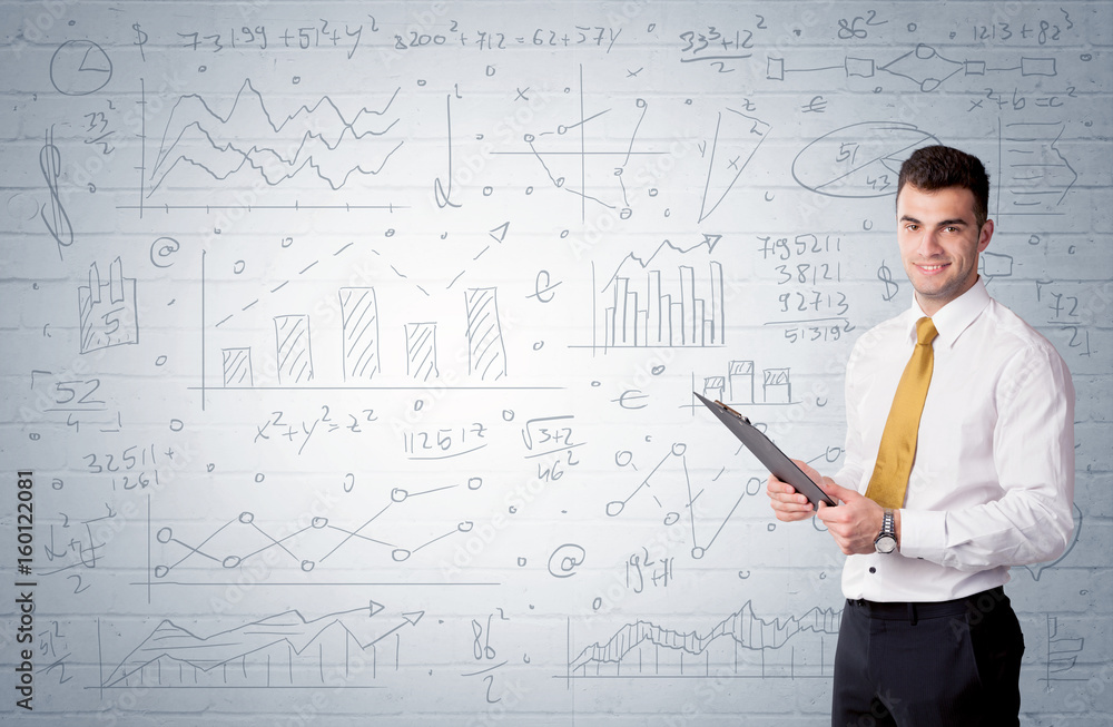 Salesman standing with drawn graph charts Salesman standing with drawn graph charts