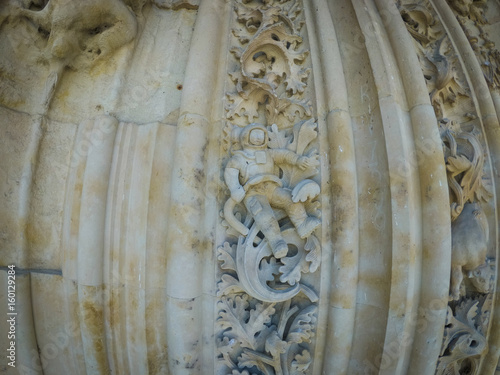 Astronaut carved on the facade of the cathedral of Salamanca in Spain photo