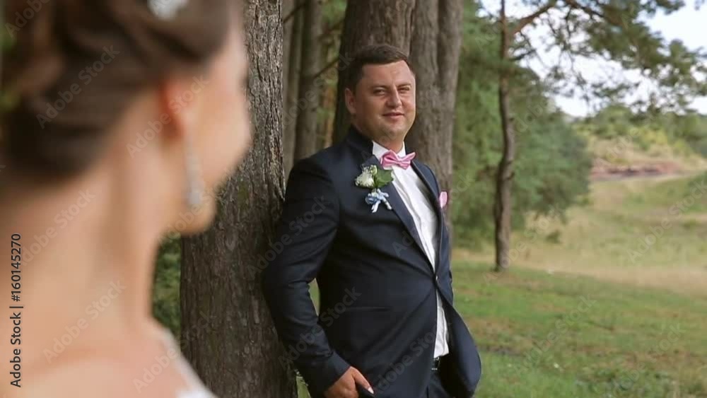 Smiling newlyweds gaze into each others eyes Smiling newlyweds gaze into each others eyes