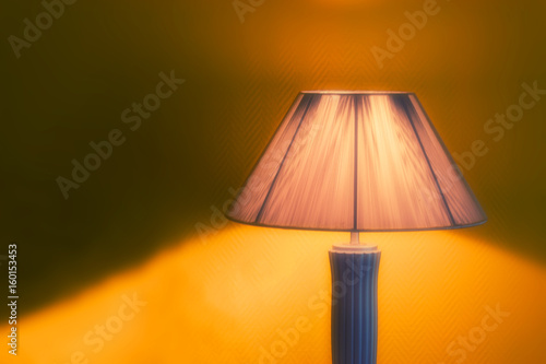 Nice luminous desk lamp on ginger background photo
