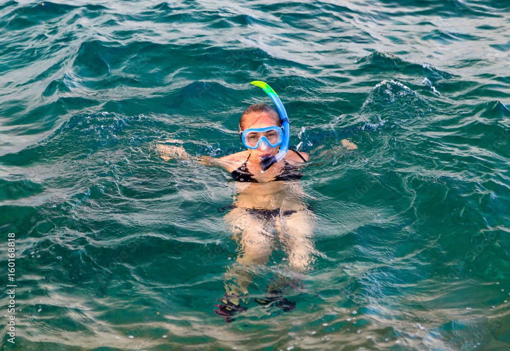 Young woman snorkeling