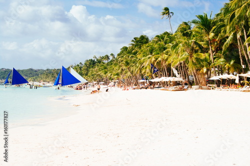 Landscape of paradise tropical island with palms and white sand beach. tourist spot in Asia Philippines