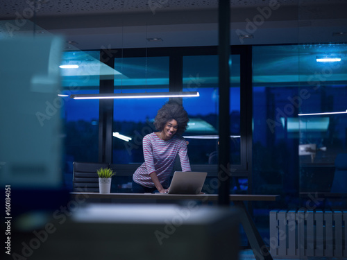 black businesswoman using a laptop in startup office