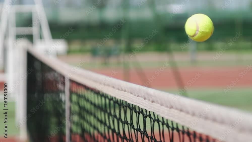tennis ball hitting net scoring point luck success concept tennis ball hitting net scoring point luck success concept