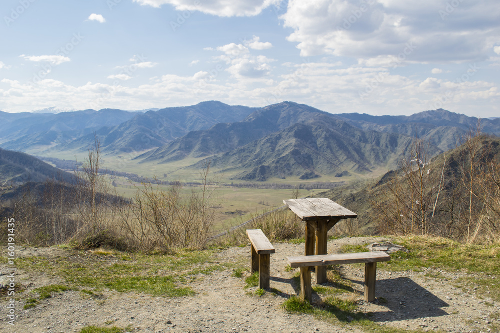 picnic on the mountain with table and benches picnic on the mountain with table and benches