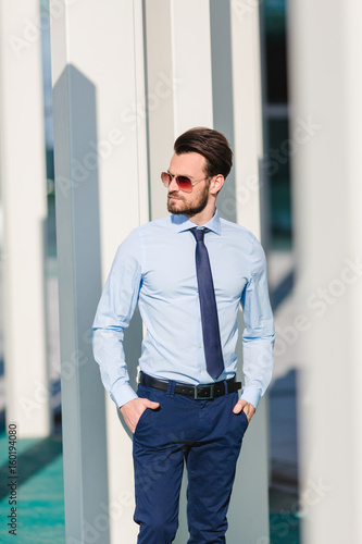 Business man with tie - blue sky and white stayer
