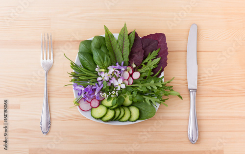 raw vegetables / Salad with different leaves, vegetables and flowers 