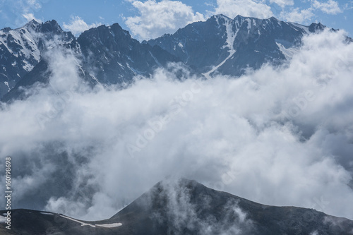 Low clouds on the mountain peaks, Kazakhstan, Kyrgyzstan