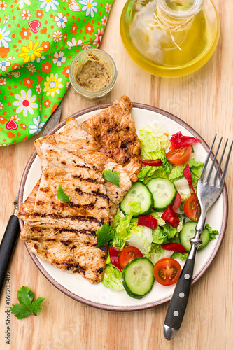 Grilled marinated turkey with fresh vegetables
