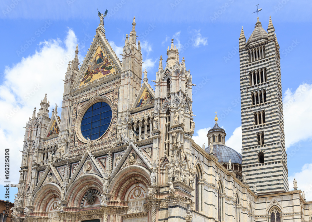 Facade of Siena Cathedral, built in years 1196 - 1348 as a Roman Catholic Marian church, and now dedicated to the Assumption of Mary 
