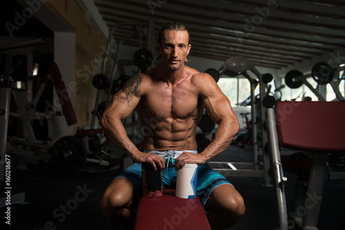 Man Posing With Supplements For Copy Space