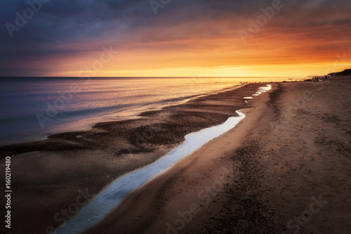 Sunrise over the beach © Patrycja