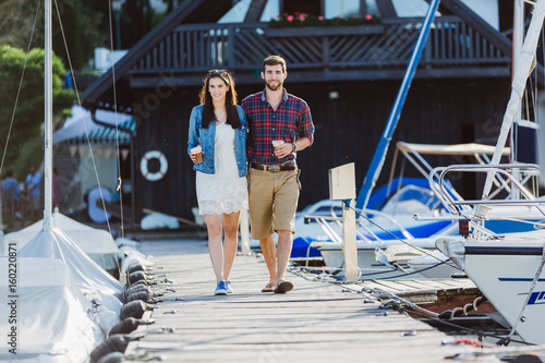 Couple walking at harbour