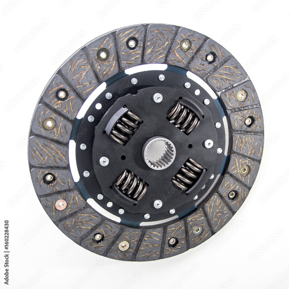 Сlutch disc for a passenger car isolated on the white background.