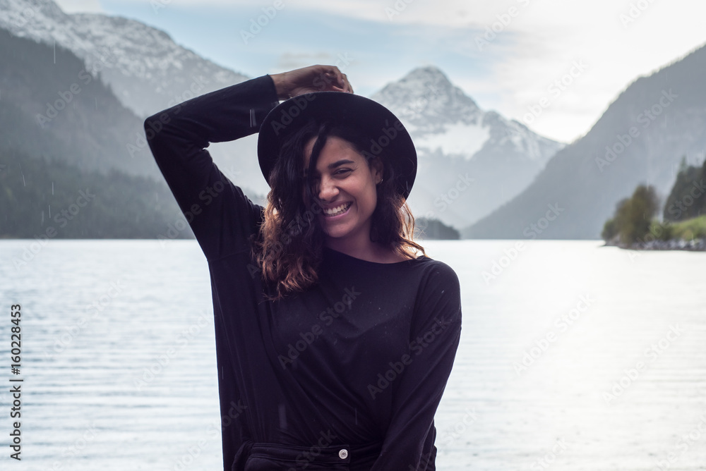 Photoshooting beautiful black swedish woman by mountain lake Tyrol Photoshooting beautiful black swedish woman by mountain lake Tyrol