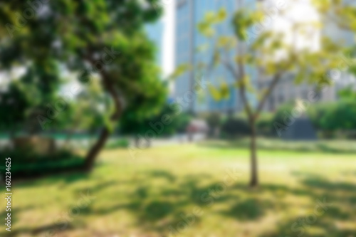 Blur background outdoor recreation public park in urban city in morning photo