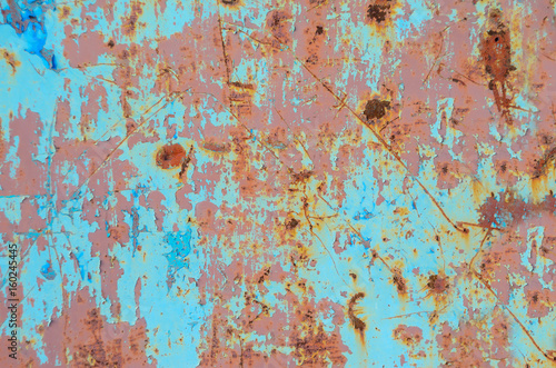 Flaking paint on on old metal surface. Old metal texture for background