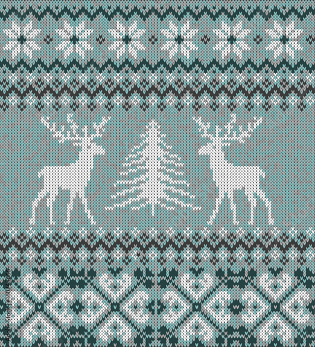 Scandinavian winter ornament. Cristmas seamless 
knitted pattern. Deer silhouette, snowflake and 
christmas tree. Vector illustration.
