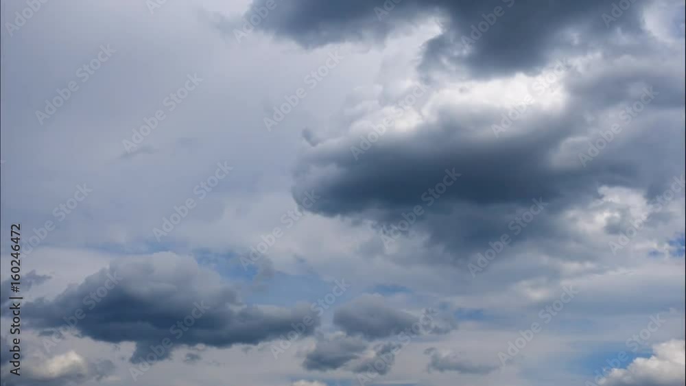 Time lapse Fluffy clouds float across the blue sky. UltraHD stock footage. Time lapse Fluffy clouds float across the blue sky. UltraHD stock footage.