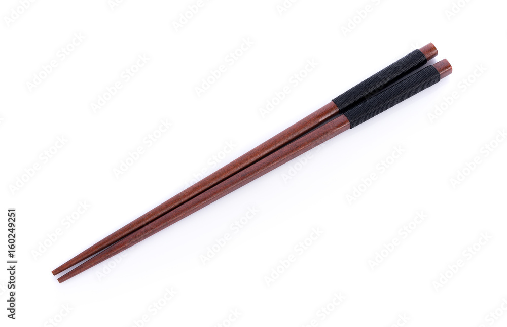 Wooden pairs of chopsticks on white background Wooden pairs of chopsticks on white background