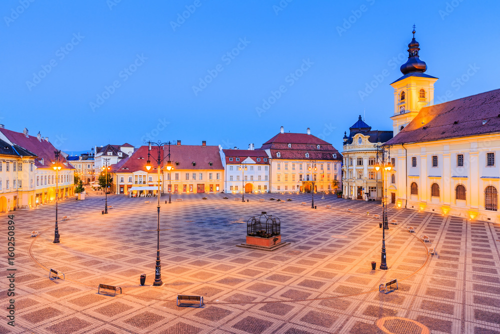 Sibiu, Romania. Large Square (Piata Mare) with the City Hall and Brukenthal palace in Transylvania.