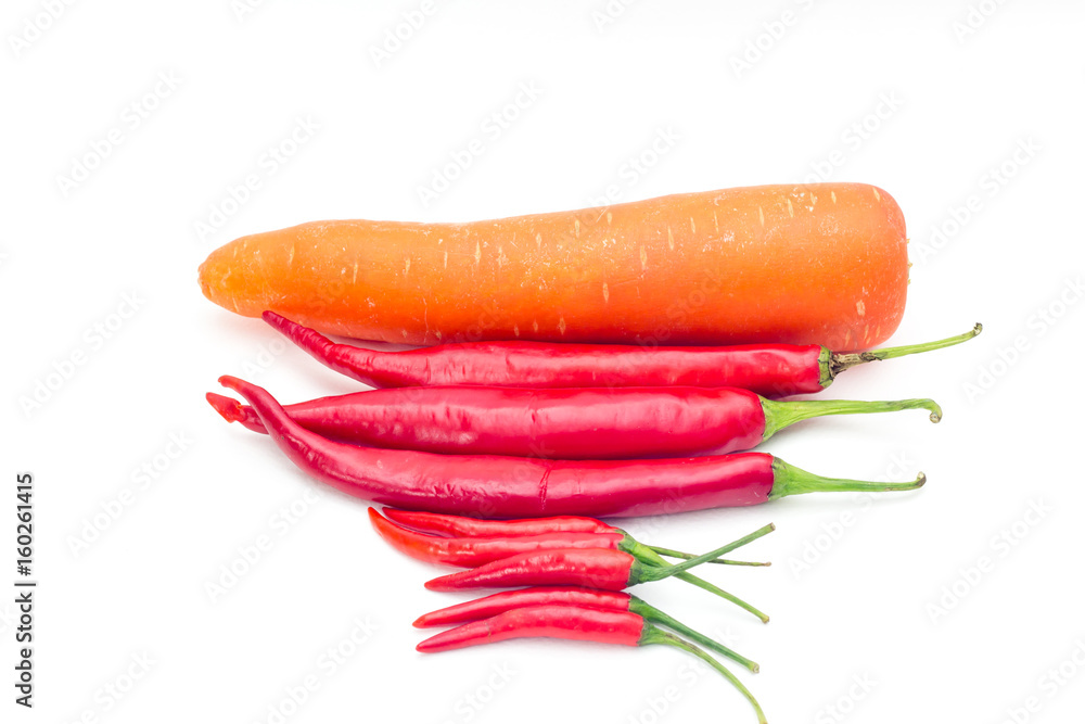 Carrot and chili for cooking Thai food isolated on white Carrot and chili for cooking Thai food isolated on white