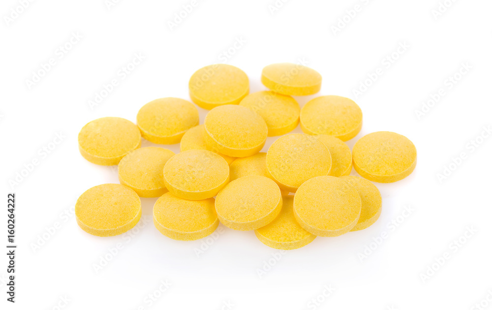 Yellow pills isolated on white background Yellow pills isolated on white background
