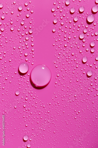 Fuchsia abstract background, water drops