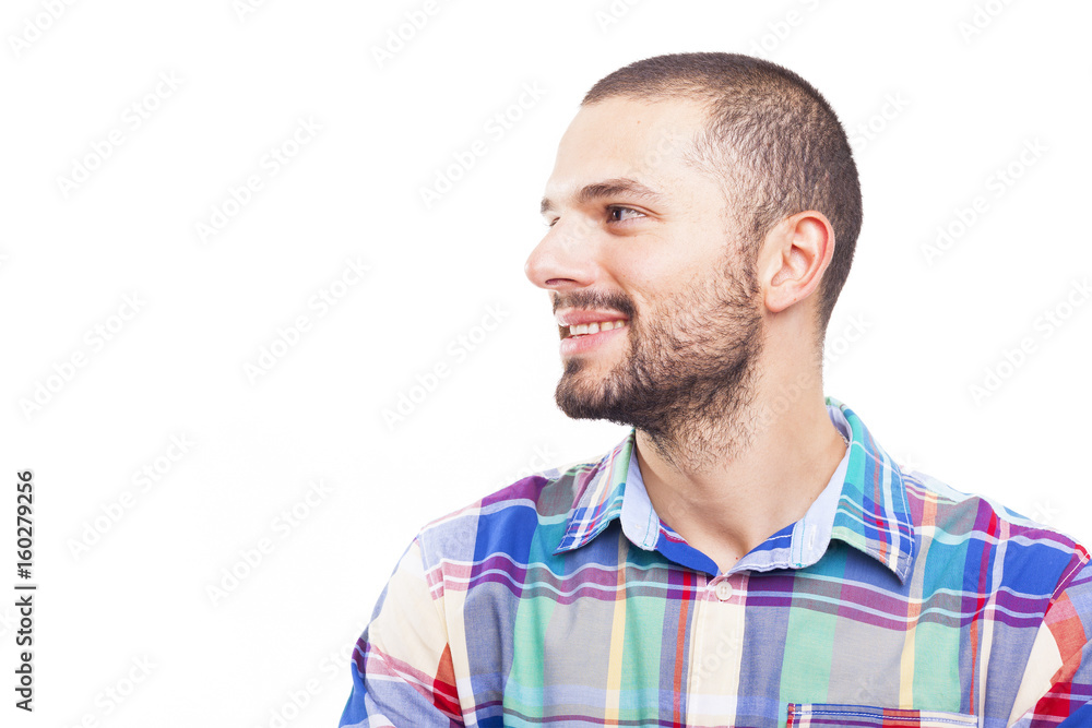 Side view of a handsome latin man looking to copyspace, isolated over a white background Side view of a handsome latin man looking to copyspace, isolated over a white background