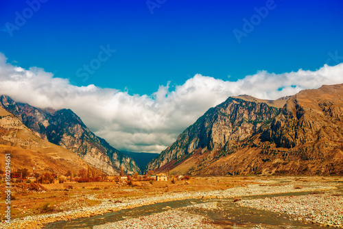 rural province scene of spring village with ravine mountain and river